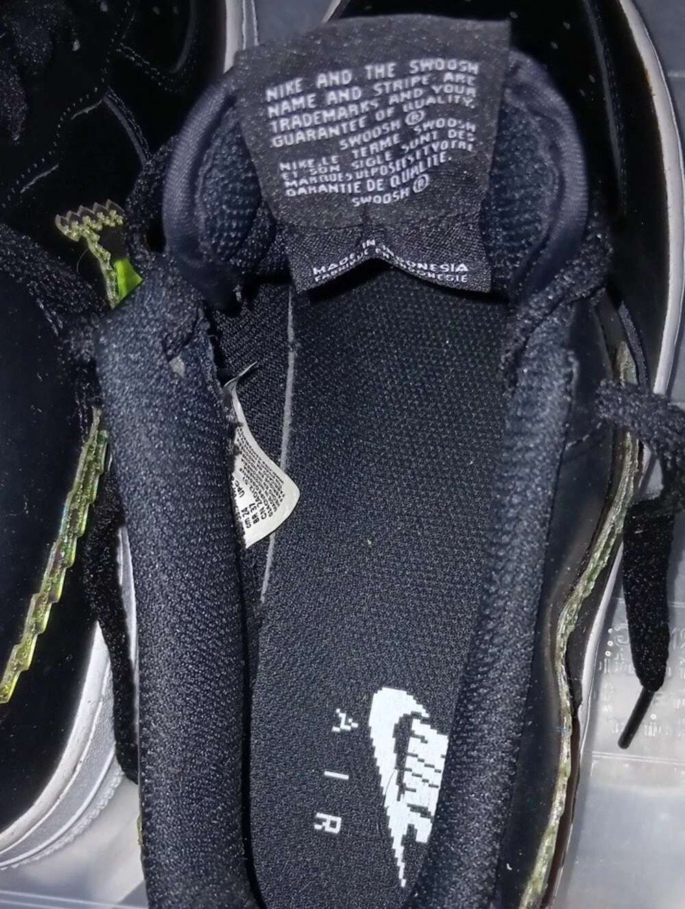 Nike Air Force 1 Black Low-Top Sneakers with White Soles